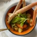 making a seafood broth with my bestie